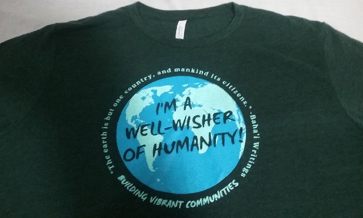 Black conference T-Shirt with blue globe & "I'm A Well-Wisher Of Humanity!"